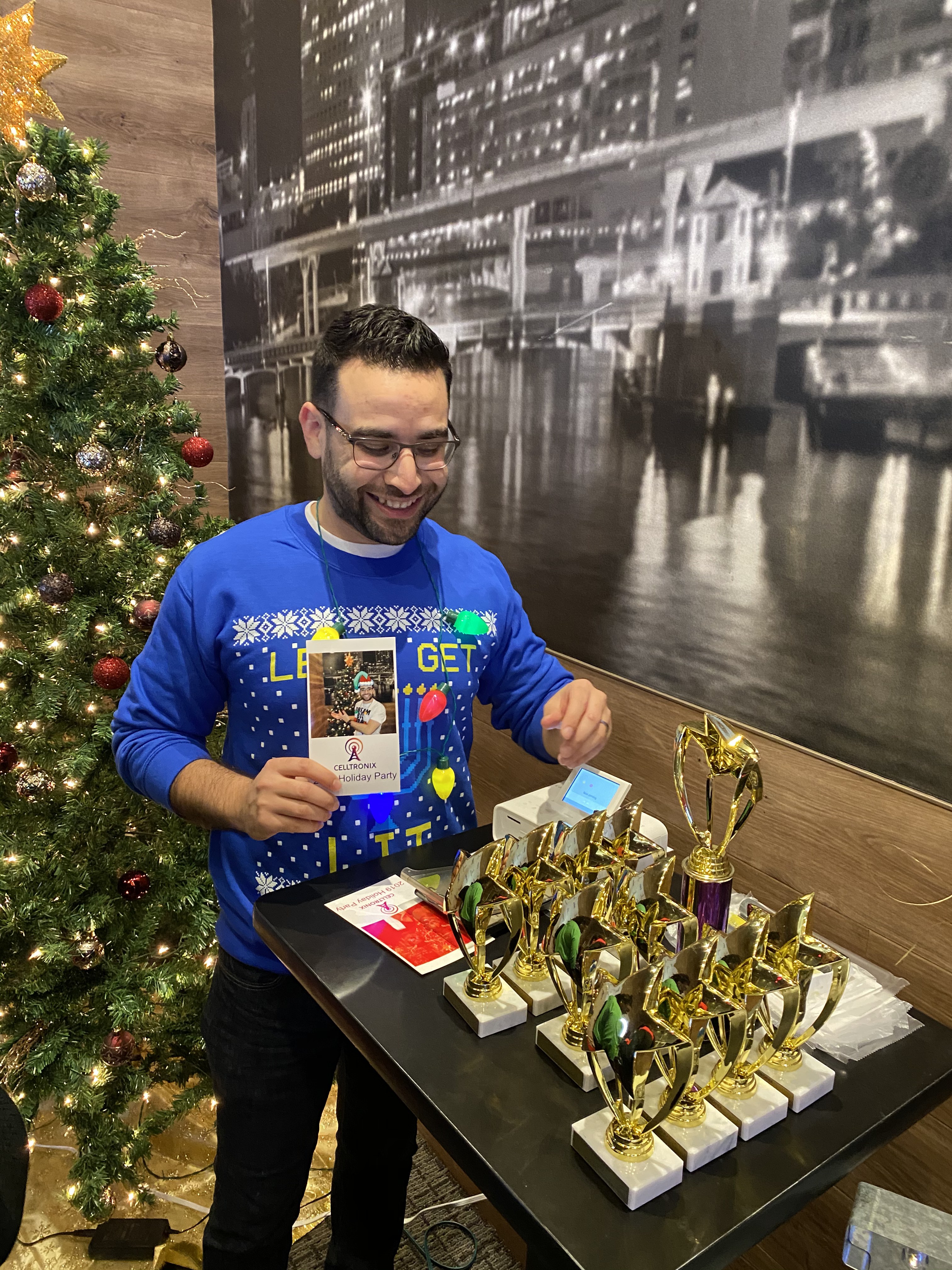 Training a team member at the Celltronix counter