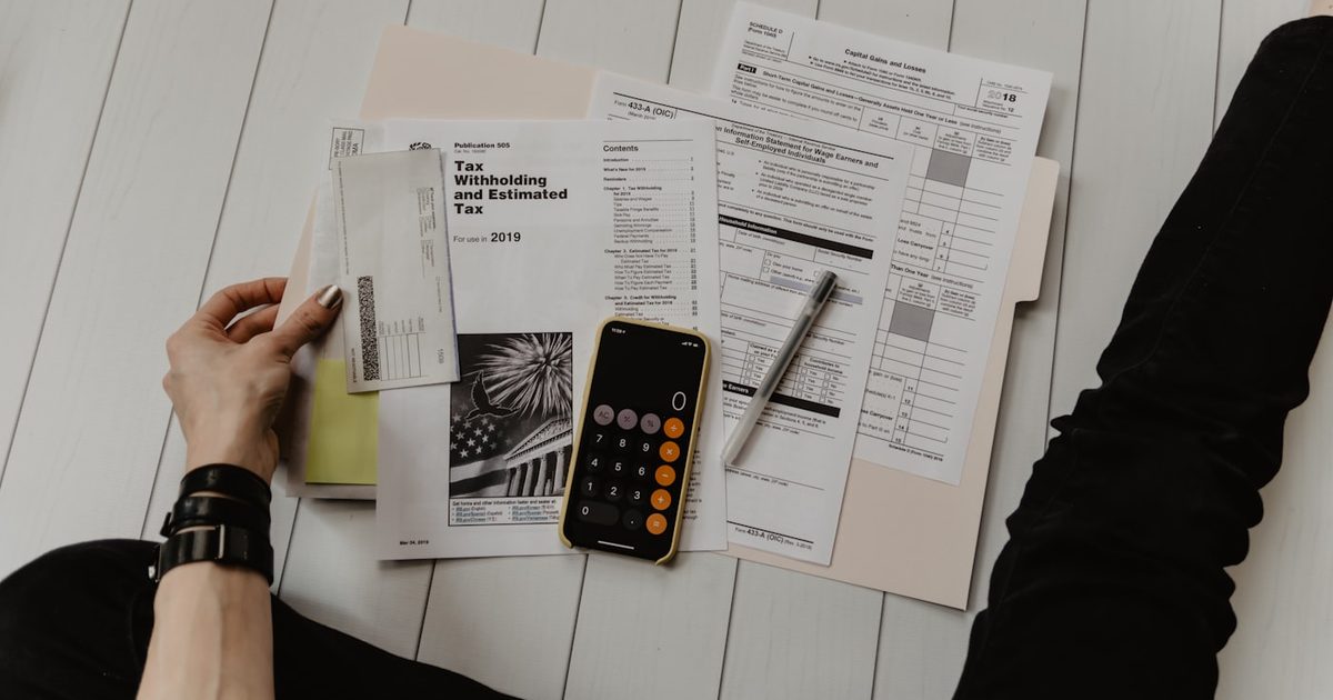 Organized desk with documents, planner, and coffee for an operational audit